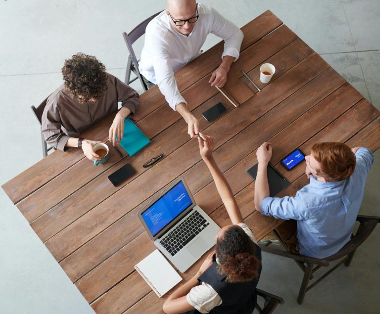 Collaboration around wooden table